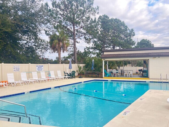 Building Photo - Furnished NMB Three-Bedroom Townhome is less than one mile from the Beach! Available Now!
