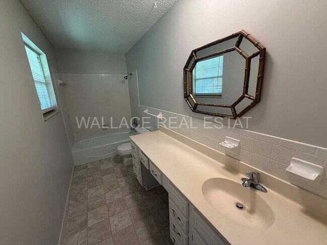 Building Photo - NEW RENTAL RATE...FARRAGUT LIVING OFFERING 4 BEDROOMS AND 3.5 BATHS WITH NICE SUN PORCH