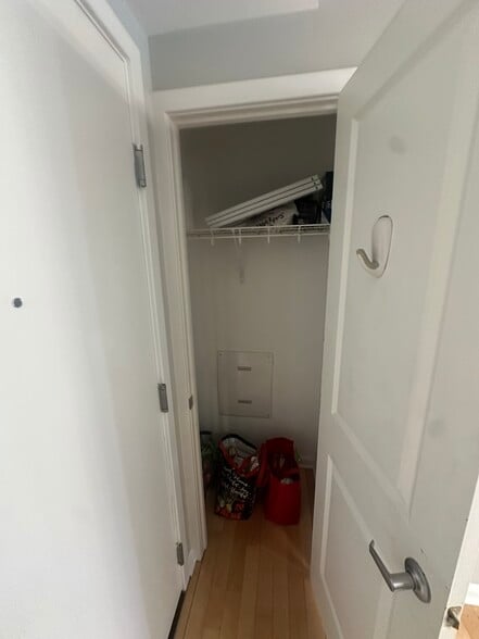 Entryway storage closet (has extra paint and air filters for tenants). - 440 L St NW