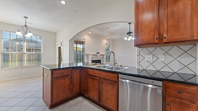 Building Photo - Charming 4-Bedroom Fayetteville Retreat with Granite Accents & Warm Fireplace!