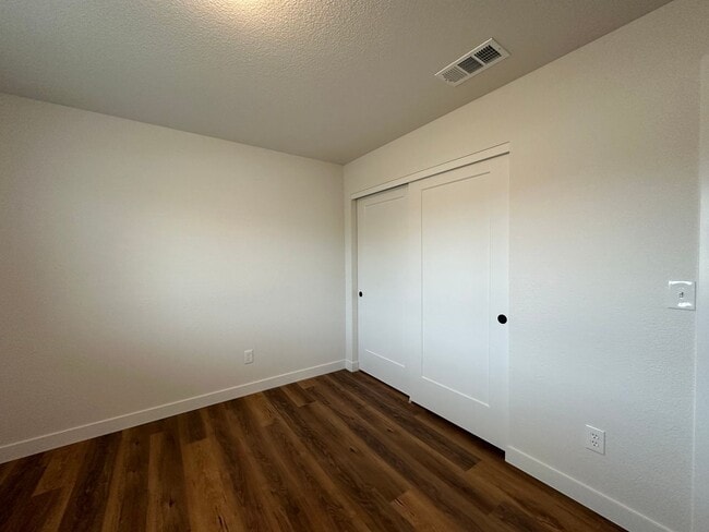 Building Photo - Updated Home with Island Kitchen, LVP Flooring, and Yard Care Included!