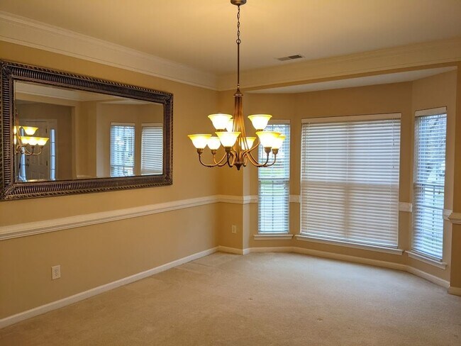 Building Photo - 4 BEDROOMS PLUS BONUS, BEAUTIFUL BACK PATI...