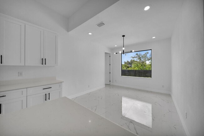 Building Photo - Brand-New Pool Home for Rent – Port Charlo...