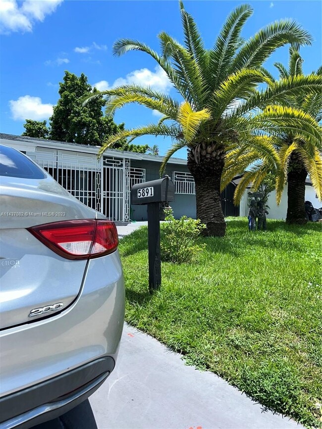 Building Photo - 5891 W 9th Ln