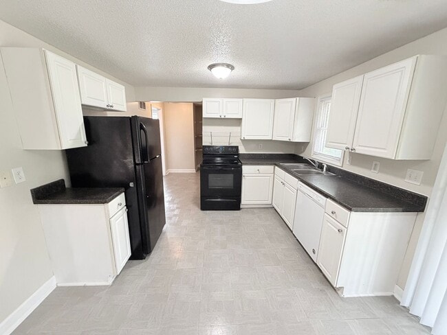 Building Photo - 6215 Lathrop Ave