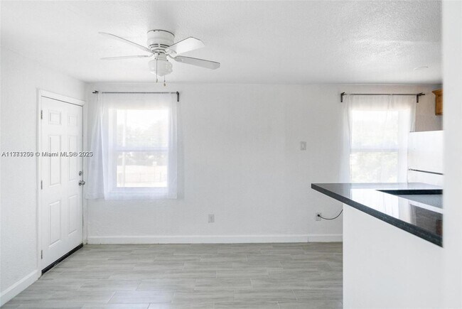 Building Photo - 6221 NW Miami Ct