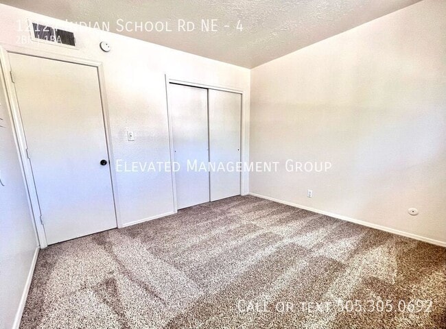 Building Photo - 12124 Indian School Rd NE