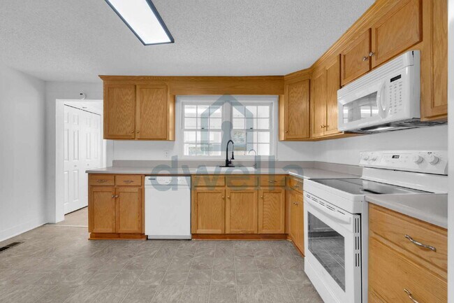 Building Photo - Fully Renovated 3-Bedroom Home in Cherokee 01 School District—Convenient Access to Interstates & ...