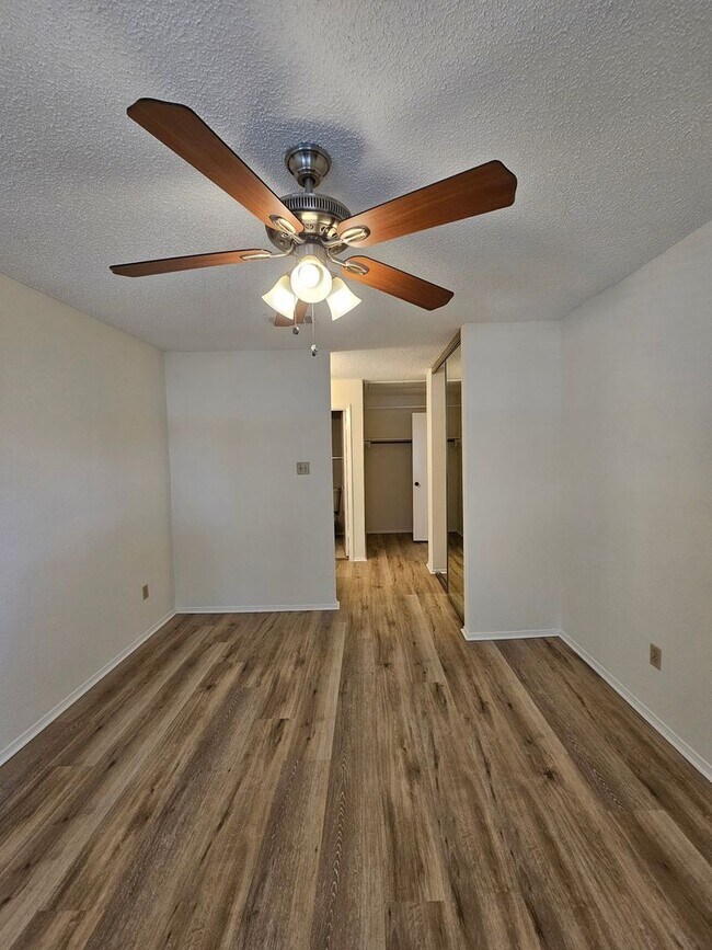 Building Photo - Beautifully Updated 2BR/2BA with Loft Oasis – Safe & Gated Community