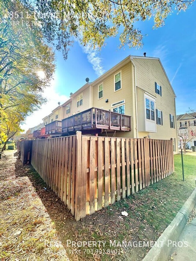 Building Photo - Updated garage 3 bedroom end unit townhome...