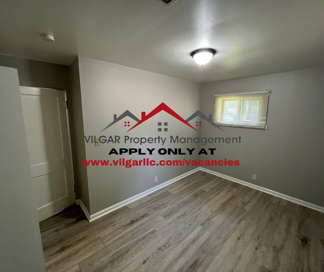 Building Photo - Step into comfort and security in this bea...