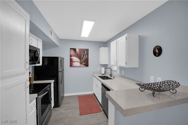 Building Photo - 6650 W Warm Springs Rd