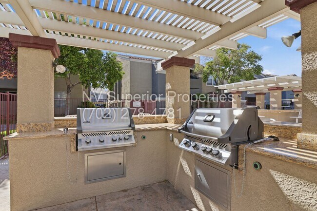 Building Photo - SW!! First floor unit with Balcony!! Gated!! Clubhouse!!  Community pool!! Spa!! Exercise Room!! ...