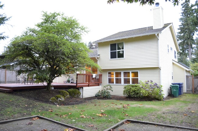 Building Photo - Private Summer Ridge Retreat with Vaulted Ceilings & Fenced Backyard