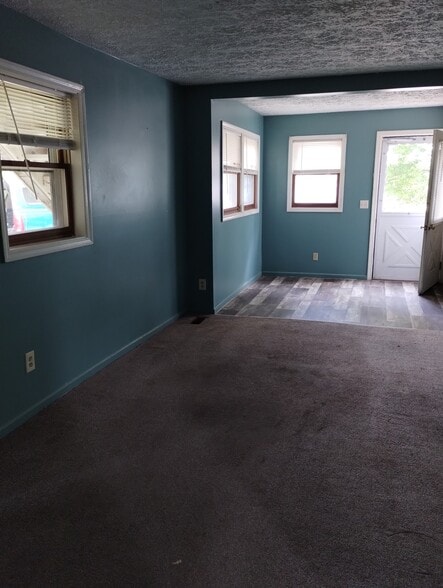 Living Room with front entrance - 5025 Clinton Street Rd