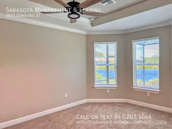Building Photo - 2 Bed 2 Bath with Den Lake View Pool Home ...