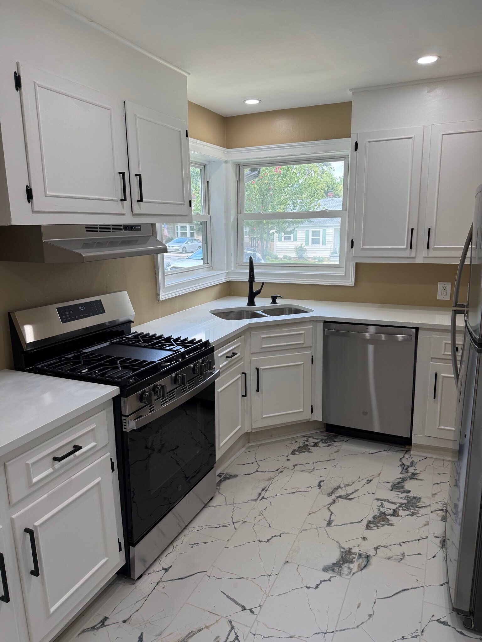 New GE Black/Stainless Steel Gas Range and New Top of the Line GE Stainless Steel Dishwasher - 18 Waters Ave