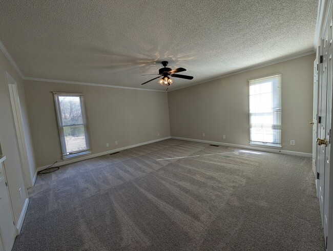 Building Photo - Gorgeous Brick 4 bedroom, 4 bathroom home located in the Farmwood community in Minthill!