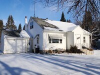 Building Photo - 306 W 4th Ave S