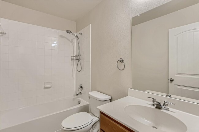 Building Photo - This well-maintained 4 bedroom home is located in a quiet neighborhood that has a community park ...