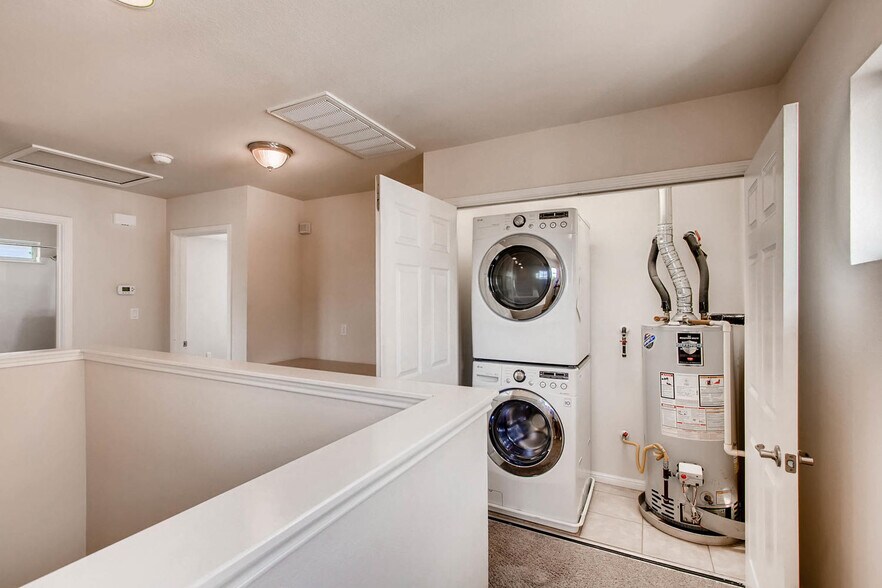 Washer and dryer in upstairs hallway - 1813 Carlson Drive