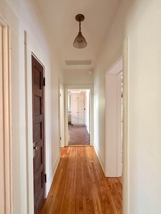 Building Photo - Meticulously Restored 1920s Craftsman on a Private, Hedged Lot | Pet Friendly!