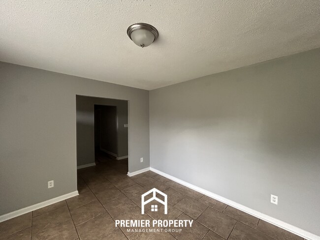 Building Photo - Massive 5BR/3BA Estate in 38125 | 2,700+ SQ FT, Vaulted Ceilings & Tile Floors