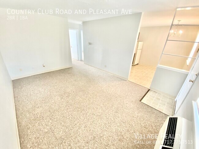 Building Photo - Roomy 2-bed end-unit w/ on-site laundry & ...