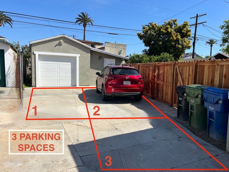 Three dedicated parking spaces at the end of the driveway. - 2824 S Orange Dr