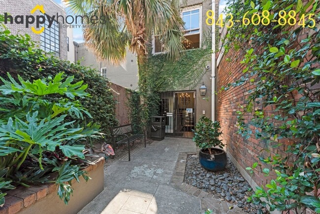 Building Photo - Charming 2/1 loft-style condo in the heart of Historic Downtown Charleston!