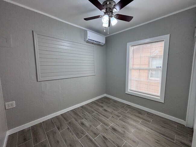 Building Photo - Remodeled 2 bedroom, 1 bathroom house with fenced yard and garage