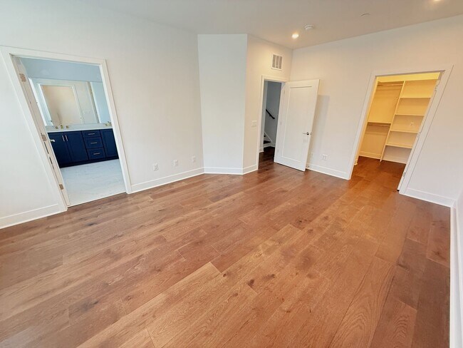 Building Photo - Brand new 4 level, 4 Bedroom Townhome with Elevator!