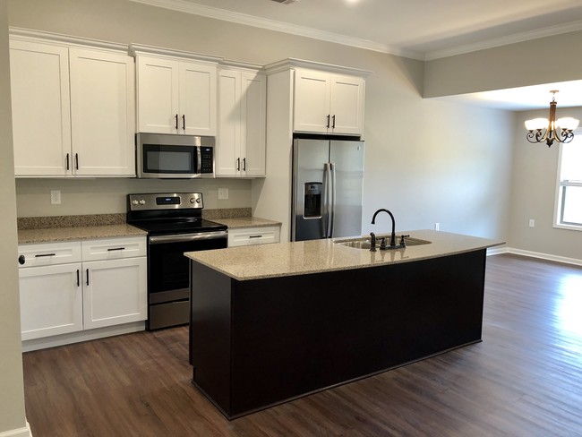 Custom Kitchen with Quartz Countertops - The Greensborough Villas