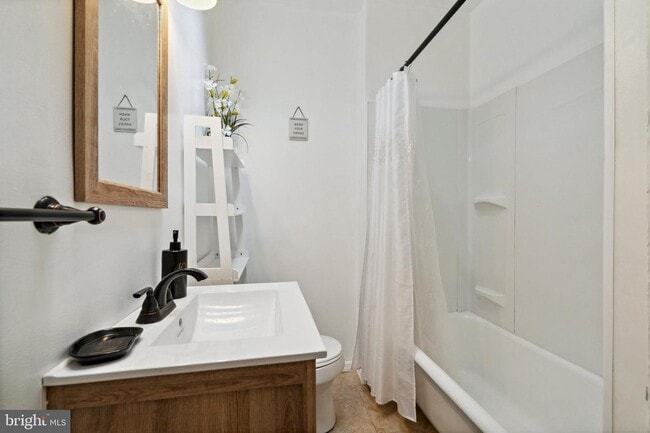 Building Photo - 7117 Woolston Ave