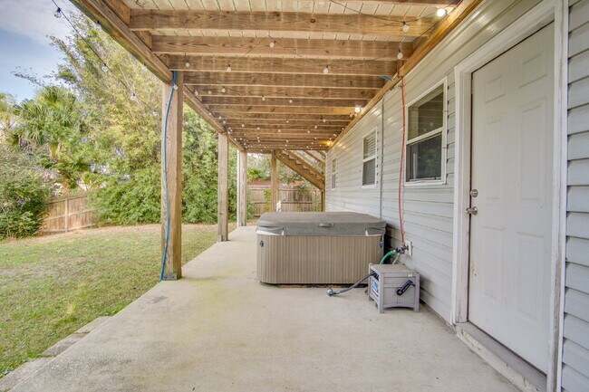 Building Photo - Live the Gulf Breeze Waterfront Life – Dock, Canal Access & Boat Lift!