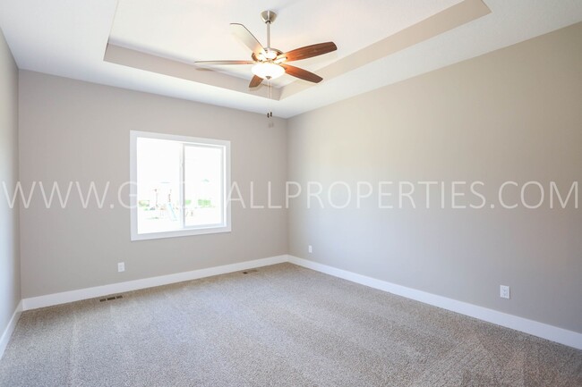 Building Photo - 4-Bedroom Ranch Home in Clive with Finished Basement & 3-Car Garage