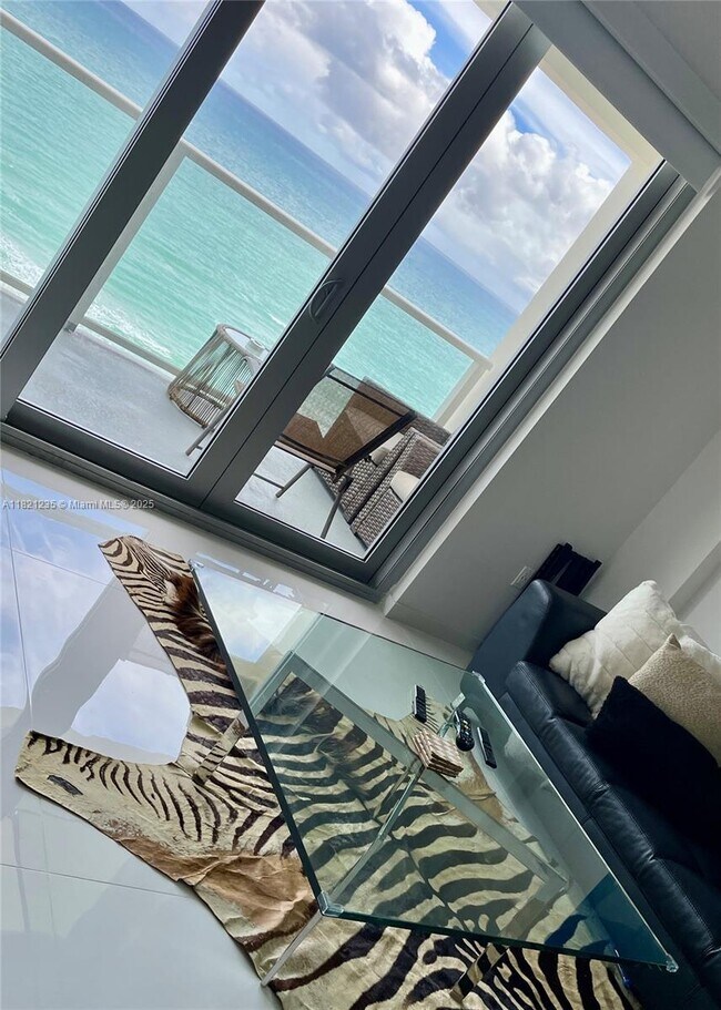 Building Photo - 5701 Collins Ave
