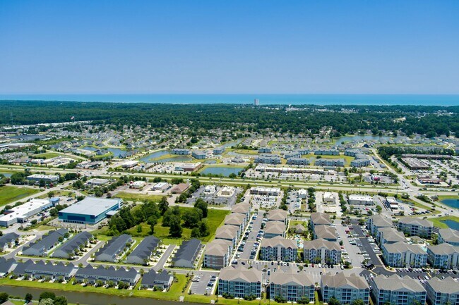 Building Photo - The Villages at Queens Harbour II