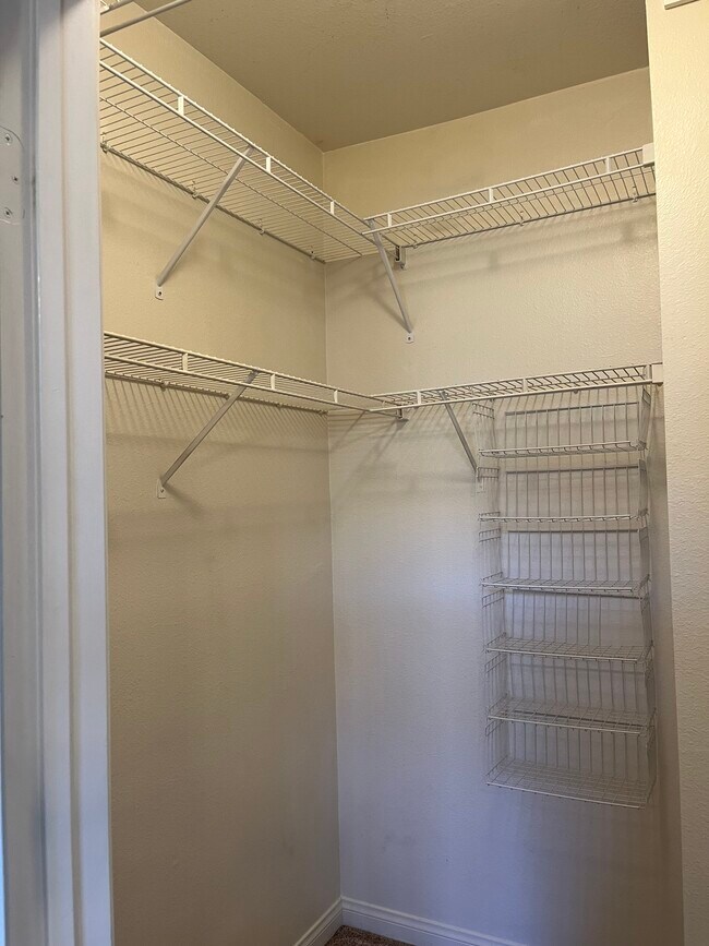 Storage shelves in closet - 8228 Station Village Ln