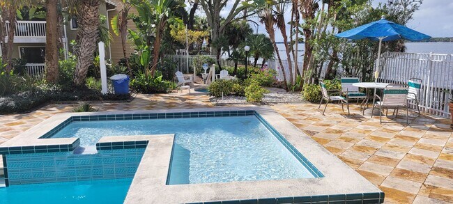 Building Photo - Funished Resort Style Condo in Gated Community- River Front