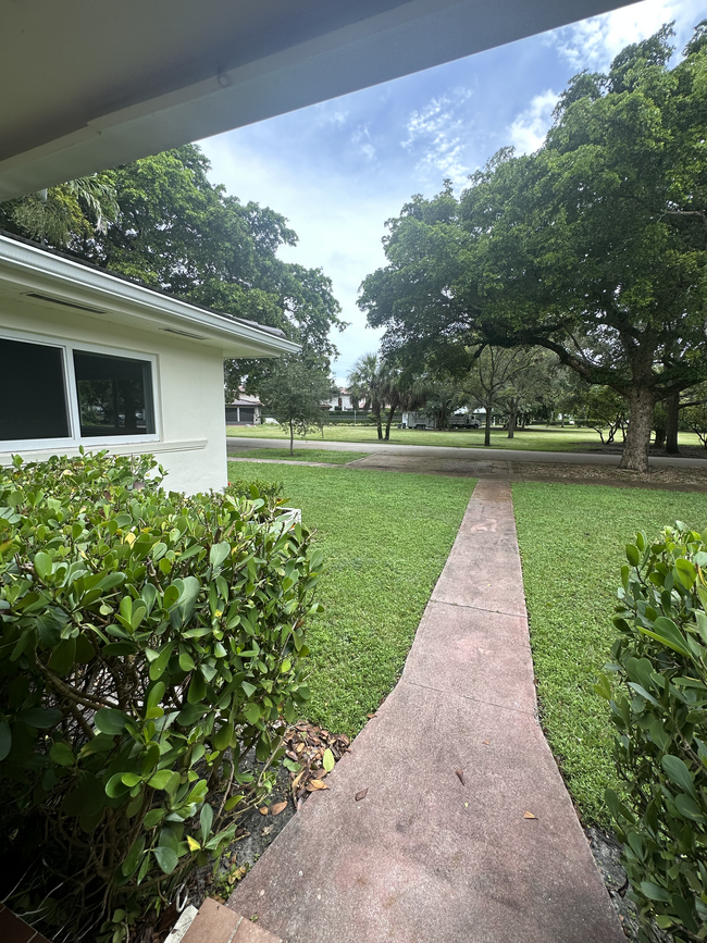 Entryway to main door, 3 private parking spaces in front - 5400 Orduna Dr