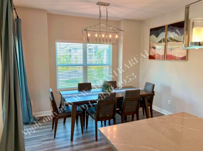 Building Photo - Spacious 4-Bedroom Townhome with Finished Basement in Blue Valley School District-Available NOW!!