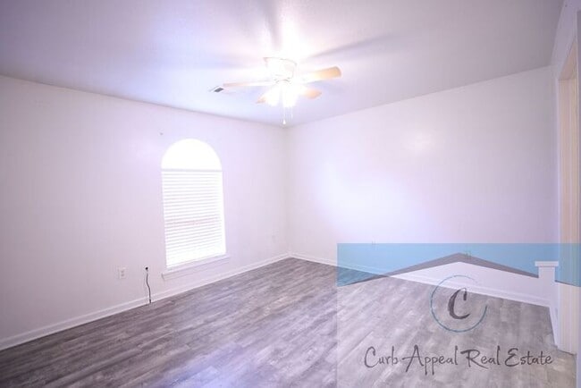Building Photo - First month move in special $900!! Beautiful 3-bed, 2 bath condo with 2-car garage - includes was...