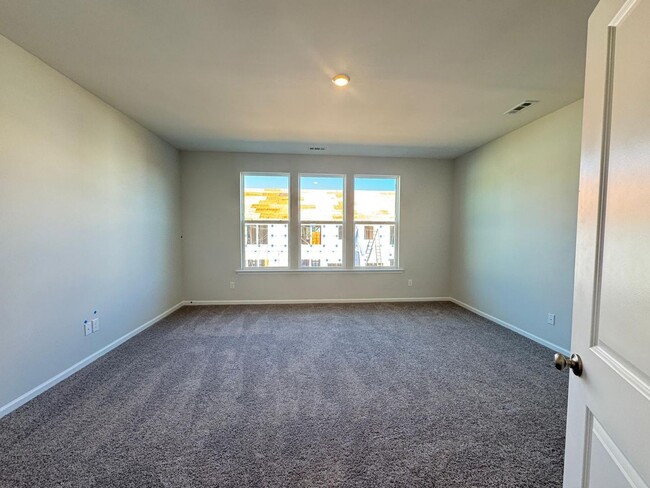 Building Photo - Brand New Open floor plan, 2 car garage to...