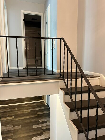 Split level home - showing dining room and upstairs hallway - 2706 Mackubin St