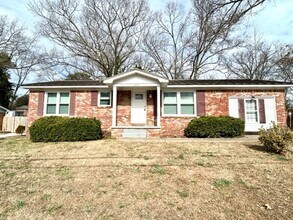 Building Photo - FOUR BEDROOM ONE AND HALF BATH BRICK RANCH HOME