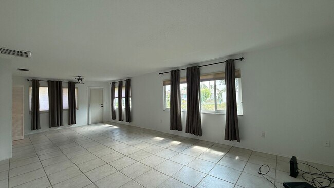 Building Photo - All inclusive 2BR/ 2B Condo in 55+ Community