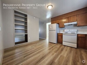 Building Photo - 2-Bedroom, 1-Bathroom Upper-Level Apartmen...