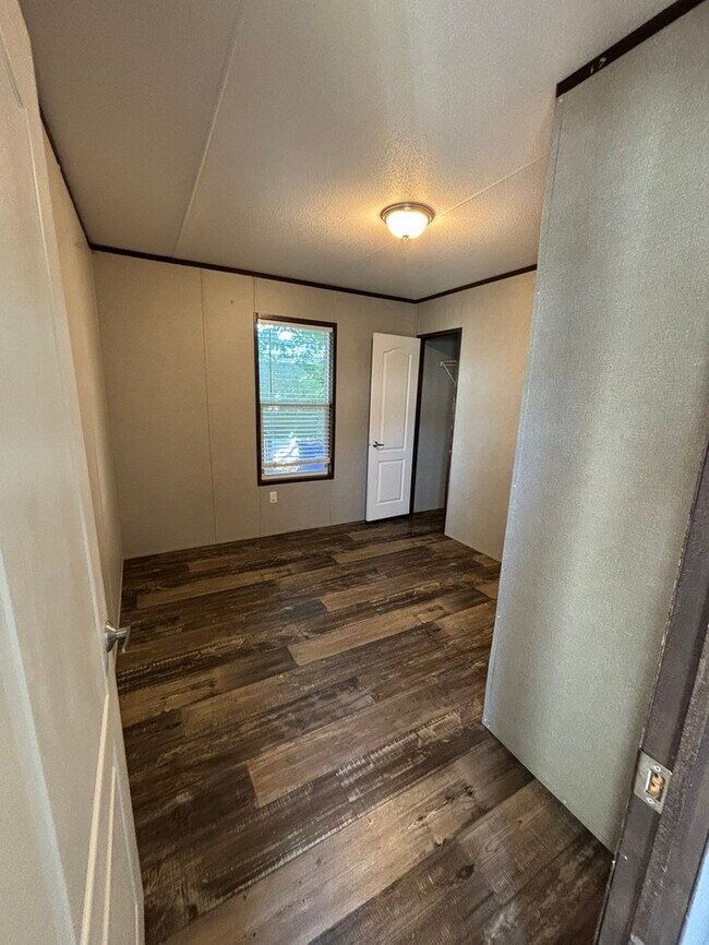 Building Photo - Triangle Mobile Home Park