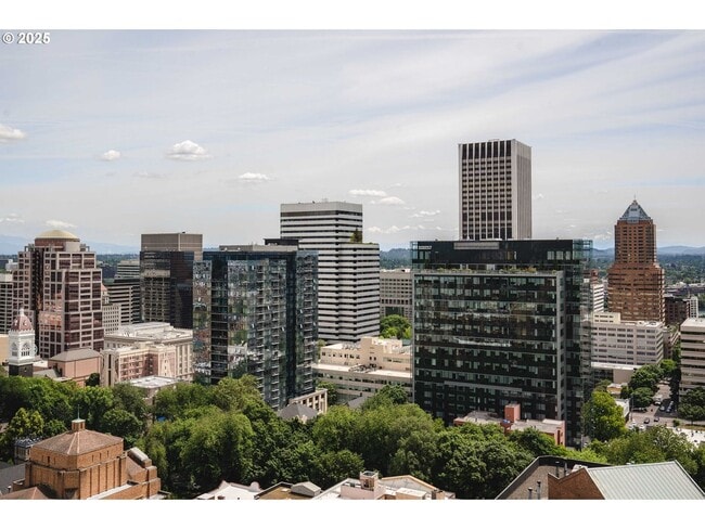 Building Photo - Modern 2-Bed/2-Bath Condo with Balcony & Prime Downtown Location